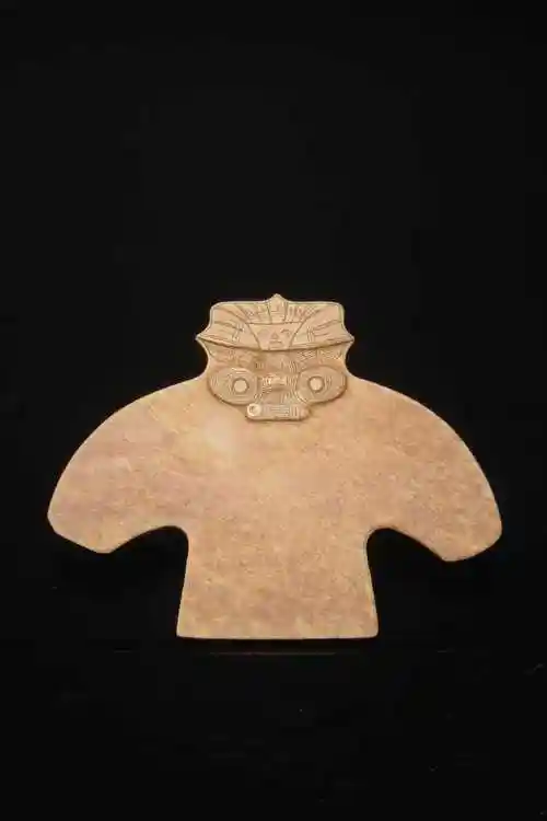 良渚人面兽身纹鸟形玉器两点