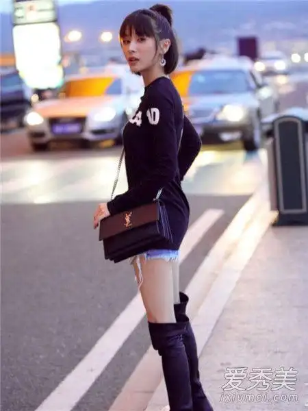 明星街拍示范冬日高筒靴穿搭穿出大长腿