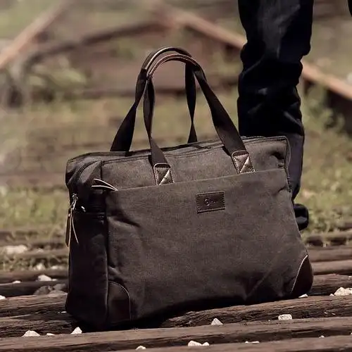 帆布旅行包男大提包搭配