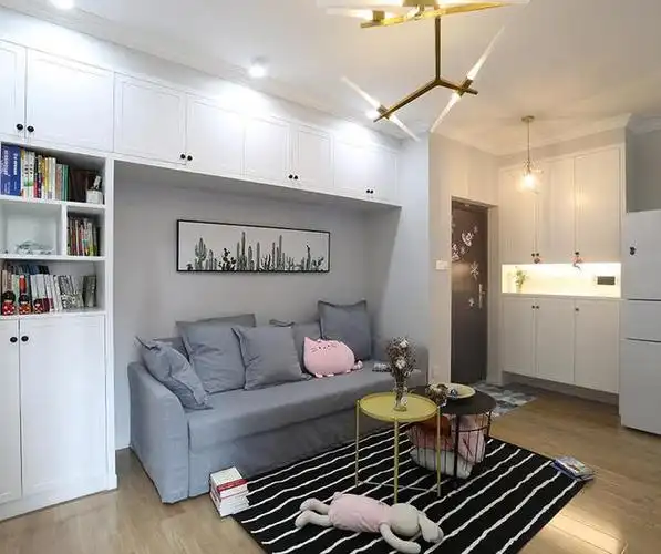 57平北欧风一居室沙发背靠嵌入式收纳柜这是将收纳做到极致呀