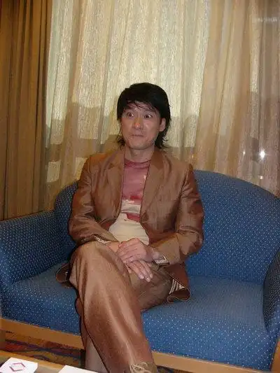 图文:周华健创作广告歌唱出"全世界的爱"-18