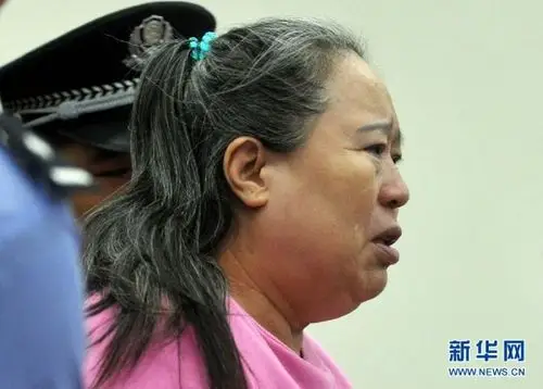 9月24日,被告人丁羽心在庭审中流下眼泪.公磊 摄