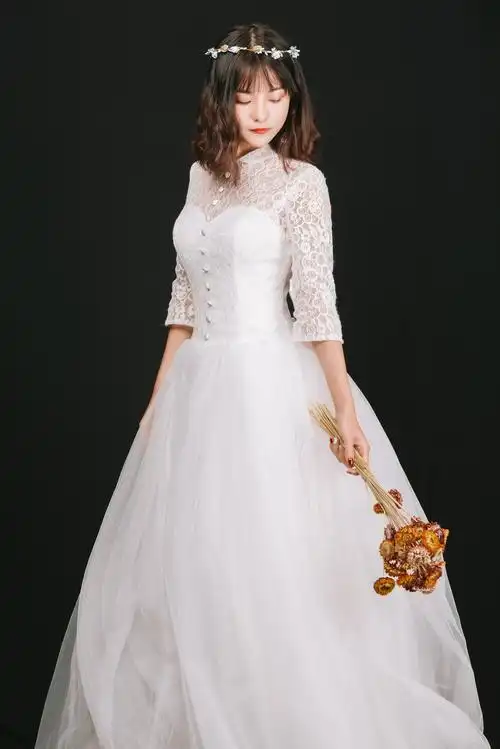 短发美女白色蕾丝婚纱唯美写真图片